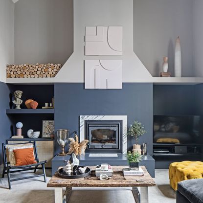 living room with fireplace and shelves