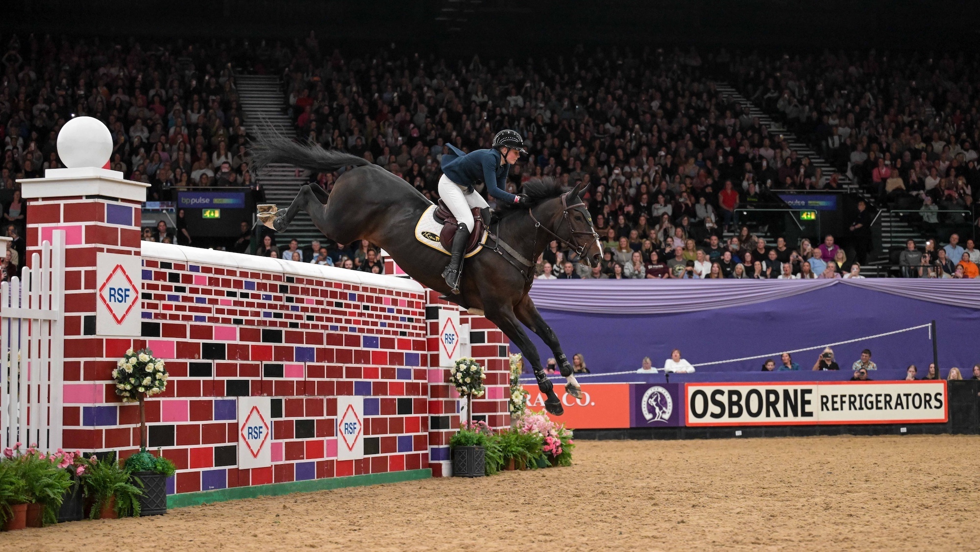 Rachel PROUDLY and ASY BOY DE LAUBRY Z &amp;amp; Joseph TRUNKFIELD and LOCOMOTION - Joint Winners - International Showjumping &amp;ndash; Ripon Select Foods Puissance CSI3* - during the Horse of the Year Show held at the NEC in Birmingham in UK between 8 -12 th October 2025