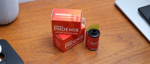 Harman Phoenix 35mm film canister next to its box