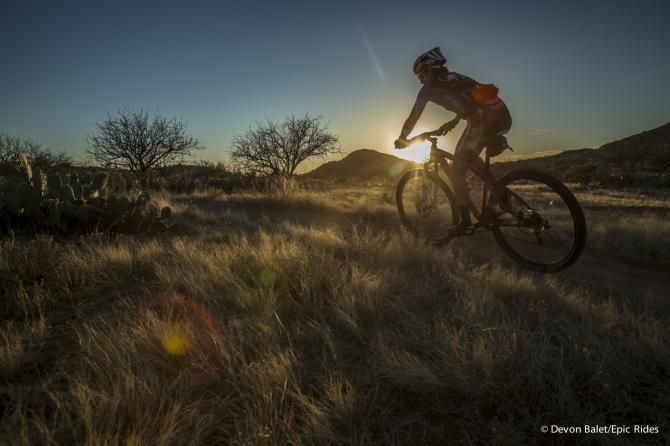 A rider near sunset in the desert during the 24 hours of Old Pueblo