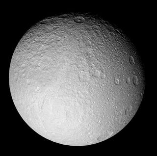 New Pictures of Saturn’s Battered Moons