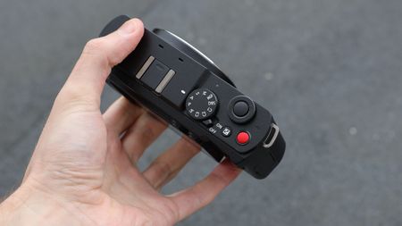 Panasonic Lumix S9 camera top down view held in a hand