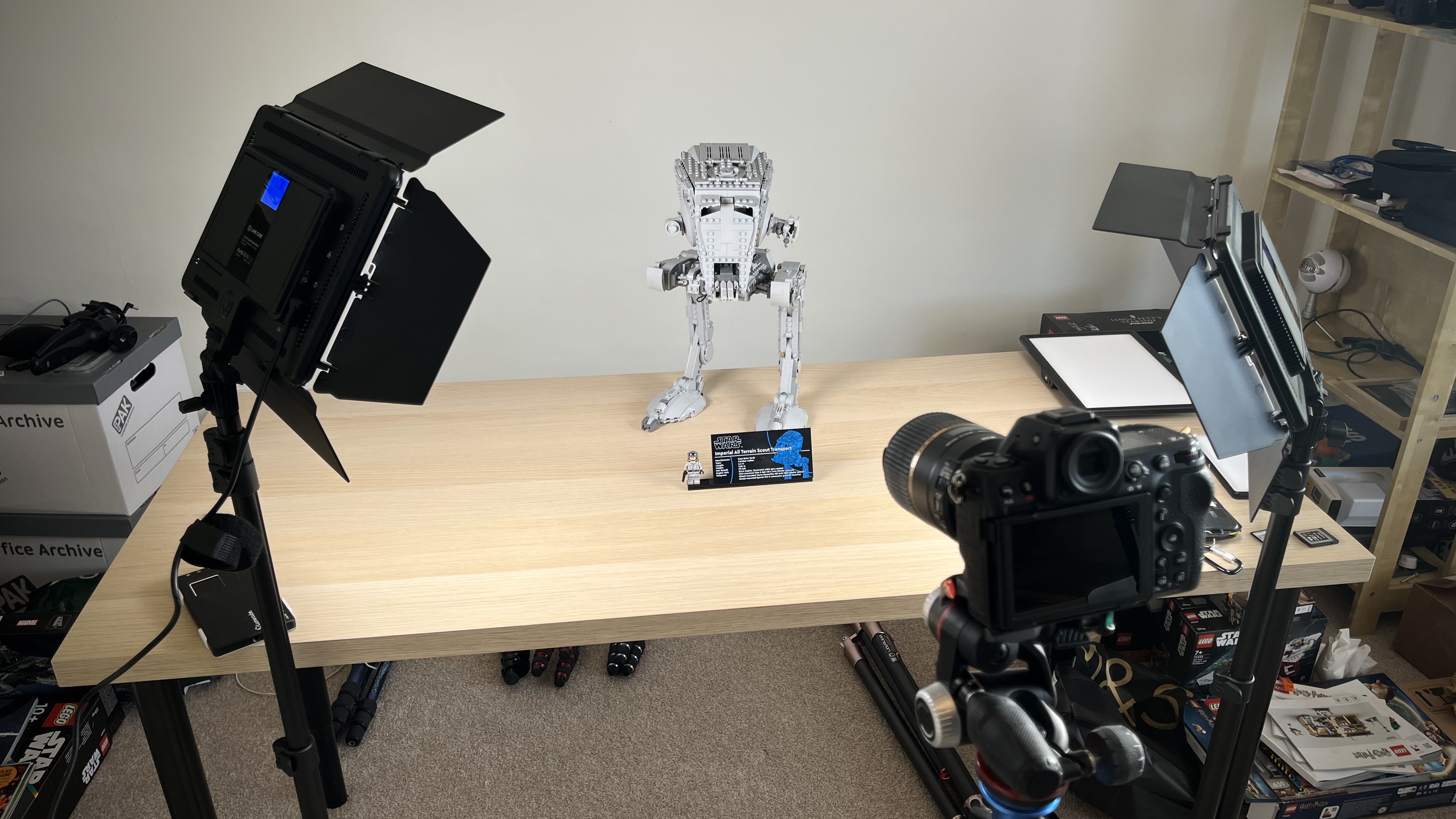 Lume Cube Studio Panel Lighting Kit either side of Lego kit, with camera in the foreground