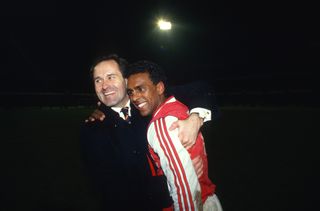 George Graham celebrates with David Rocastle after Arsenal's League Cup semi-final win over Tottenham in March 1987.