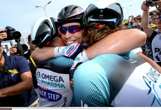 Smiles and hugs for Omega Pharma-Quick Step after Mark Cavendish wins stage 5