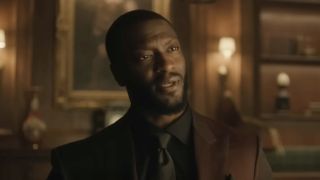 Aldis Hodge as Alex Cross in a suit in Cross