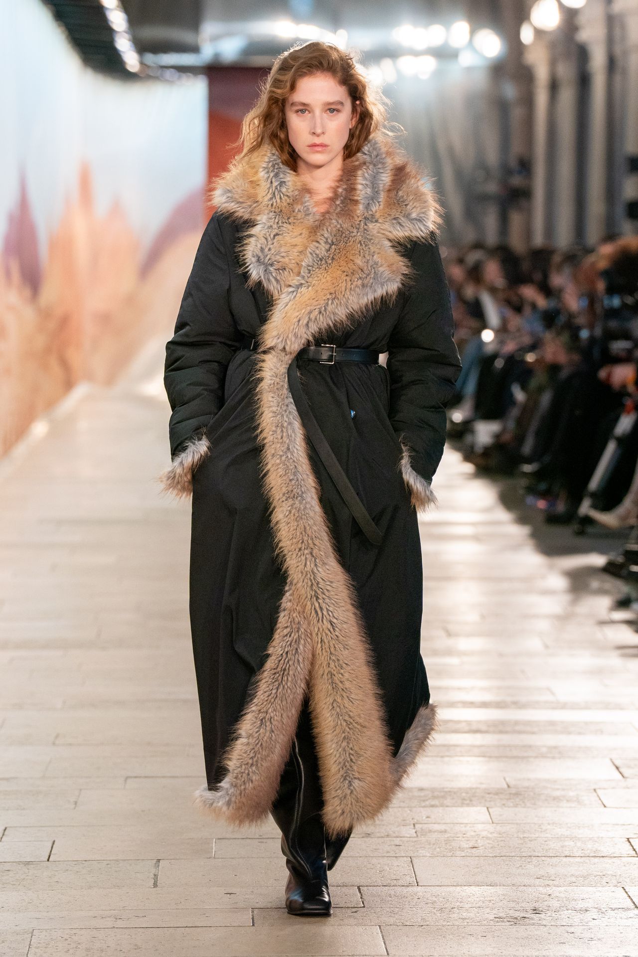 Time model wears faux fur coat