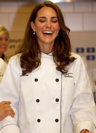Kate Middleton wearing a chef's jacket