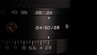 A close-up photo of the new Thypoch Voyager 24-50mm f/2.8