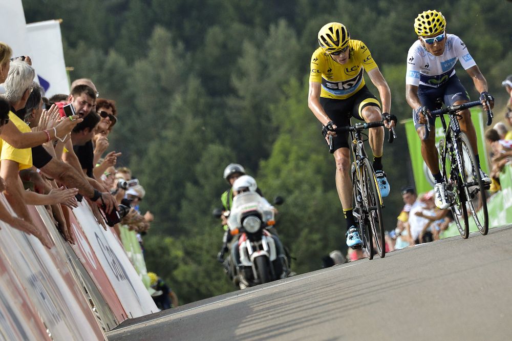 Chris Froome chases Nairo Quintana during stage 14.