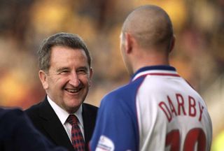 Rushden & Diamonds chairman Max Griggs greets player Duane Darby, 2001