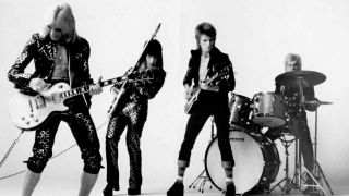 David Bowie and the Spiders from Mars playing live