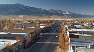 Aerial view from above Main Street of Richfield, a small town in Sevier County, Utah, looking to the mountains beyond.