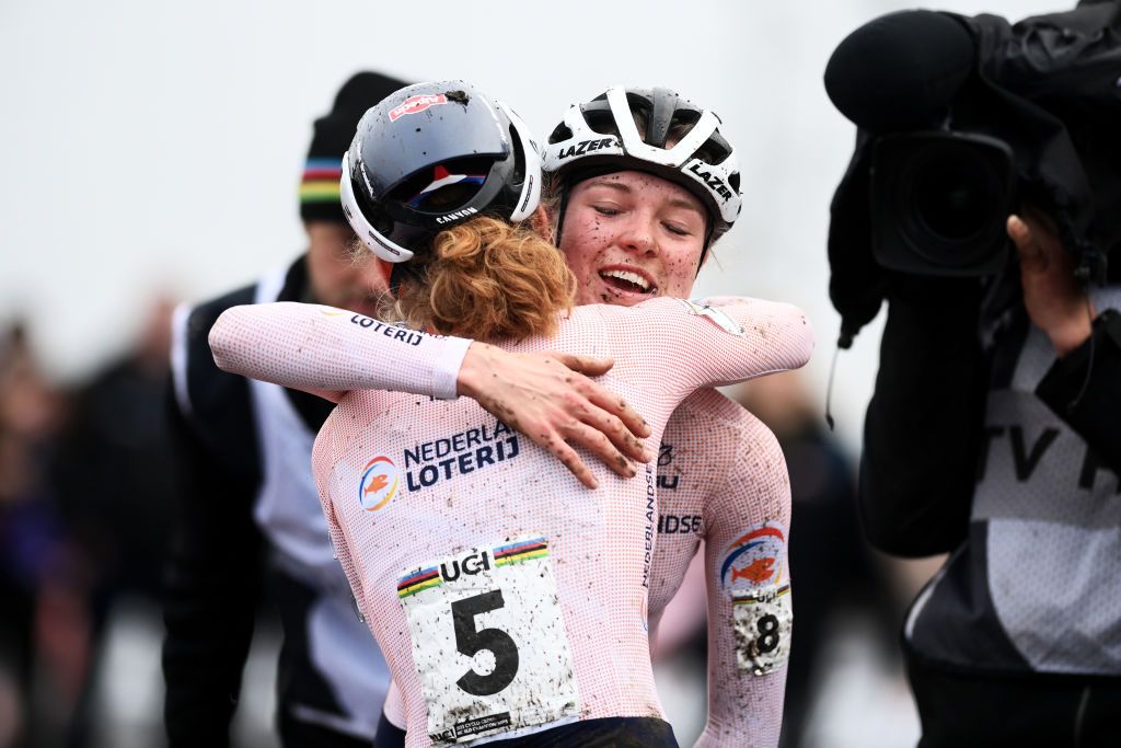 HOOGERHEIDE NETHERLANDS FEBRUARY 04 Race winner Fem van Empel of The Netherlands and Puck Pieterse of The Netherlands on second place celebrate at finish line during the 74th World Championships CycloCross 2023 Womens Elite CXWorldCup Hoogerheide2023 on February 04 2023 in Hoogerheide Netherlands Photo by David StockmanGetty Images