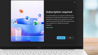 An Asus laptop screen showing a 'subscription required' message on Windows 11