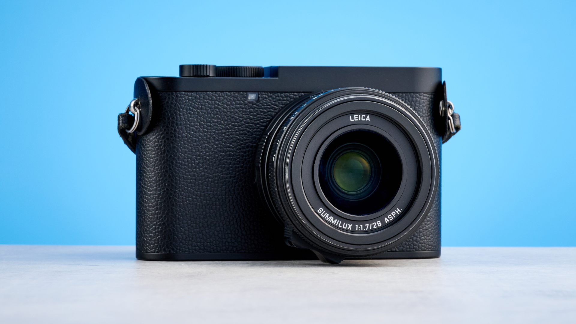 A black Leica Q3 Monochrom black-and-white mirrorless camera