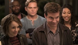 Game Night Rachel McAdams Jason Bateman politely smiling