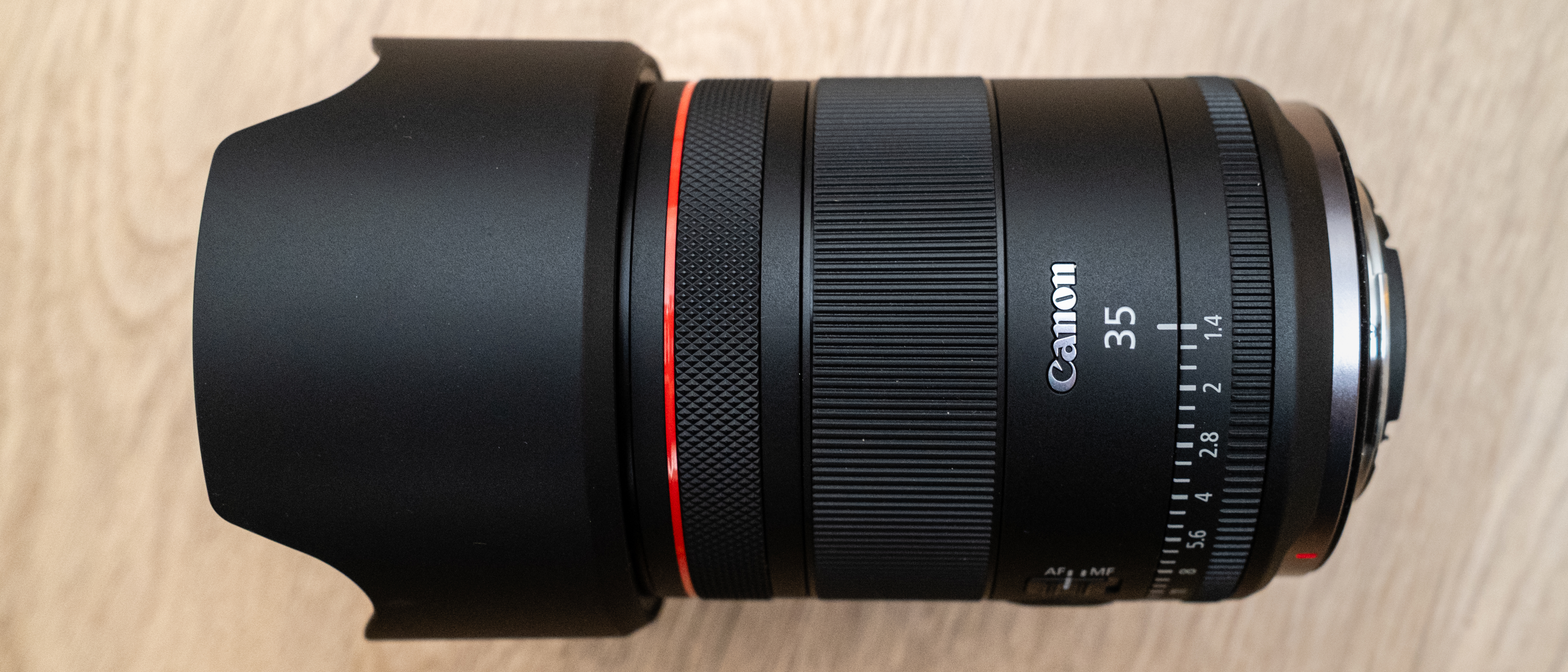 Canon RF35 f/1.4L VCM with its lens hood attached
