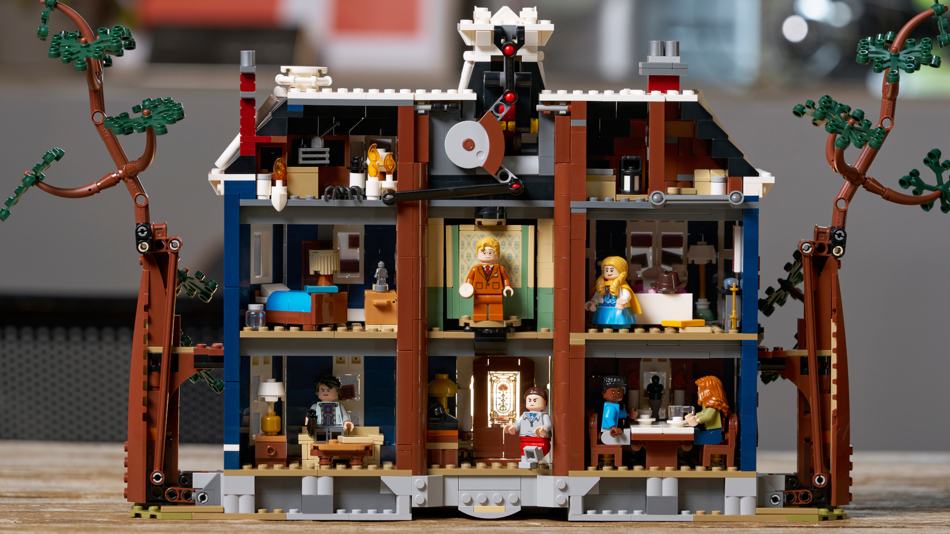 The Lego Creel House rooms, with minifigures inside