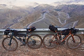 Image shows Anna and Stefan's bikes in front of the Tizi n’Tichka pass in Morocco