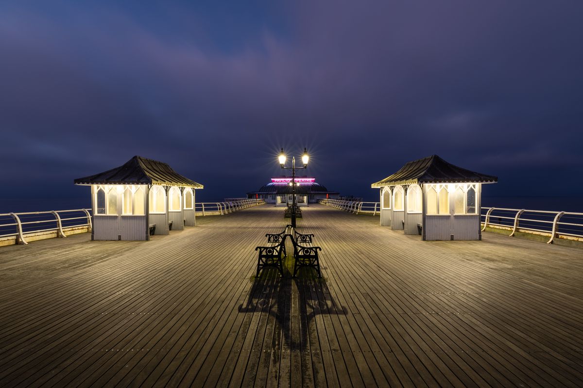 Photo of a pier at night taken with a Canon RF 15-35mm f/2.8L IS USM and Canon EOS R1