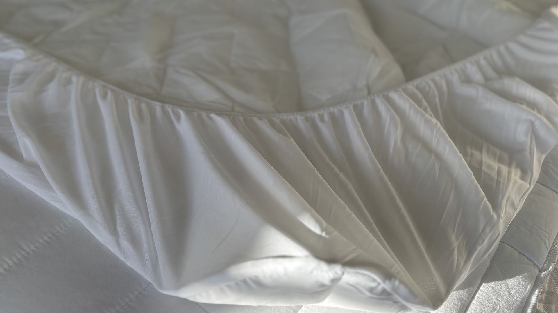 Testing the Fogarty Temperature Balance Mattress Protector on the bed