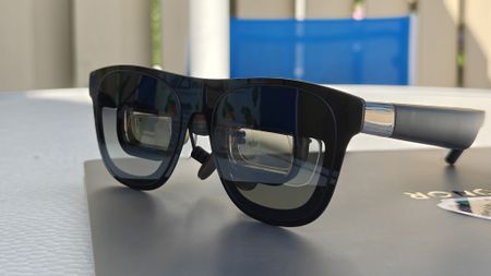 Xreal One Pro smart glasses with an Xreal Eye camera attached