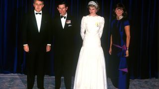 Charles, Prince of Wales, and Diana, Princess of Wales, visit Canada, At a dinner in Vancouver, British Columbia, Diana is wearing a white Murray Arbeid dress and Queen Mary's diamond and pearl tiara, 3rd May 1986.