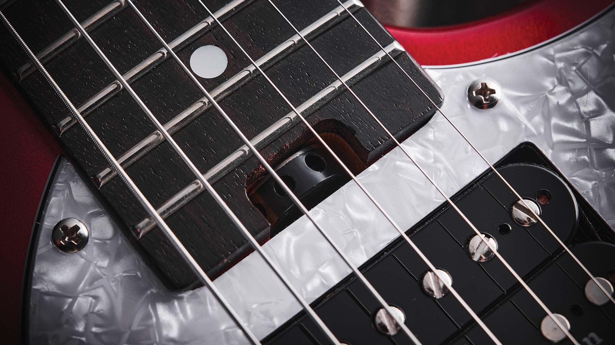 The red hardtail pickup-swapping offset is made in China, and comes with three Seymour Duncan and Guitar-X pickups included