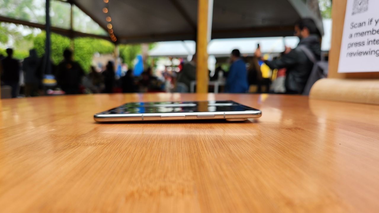 The Google Pixel Fold laying flat on a table