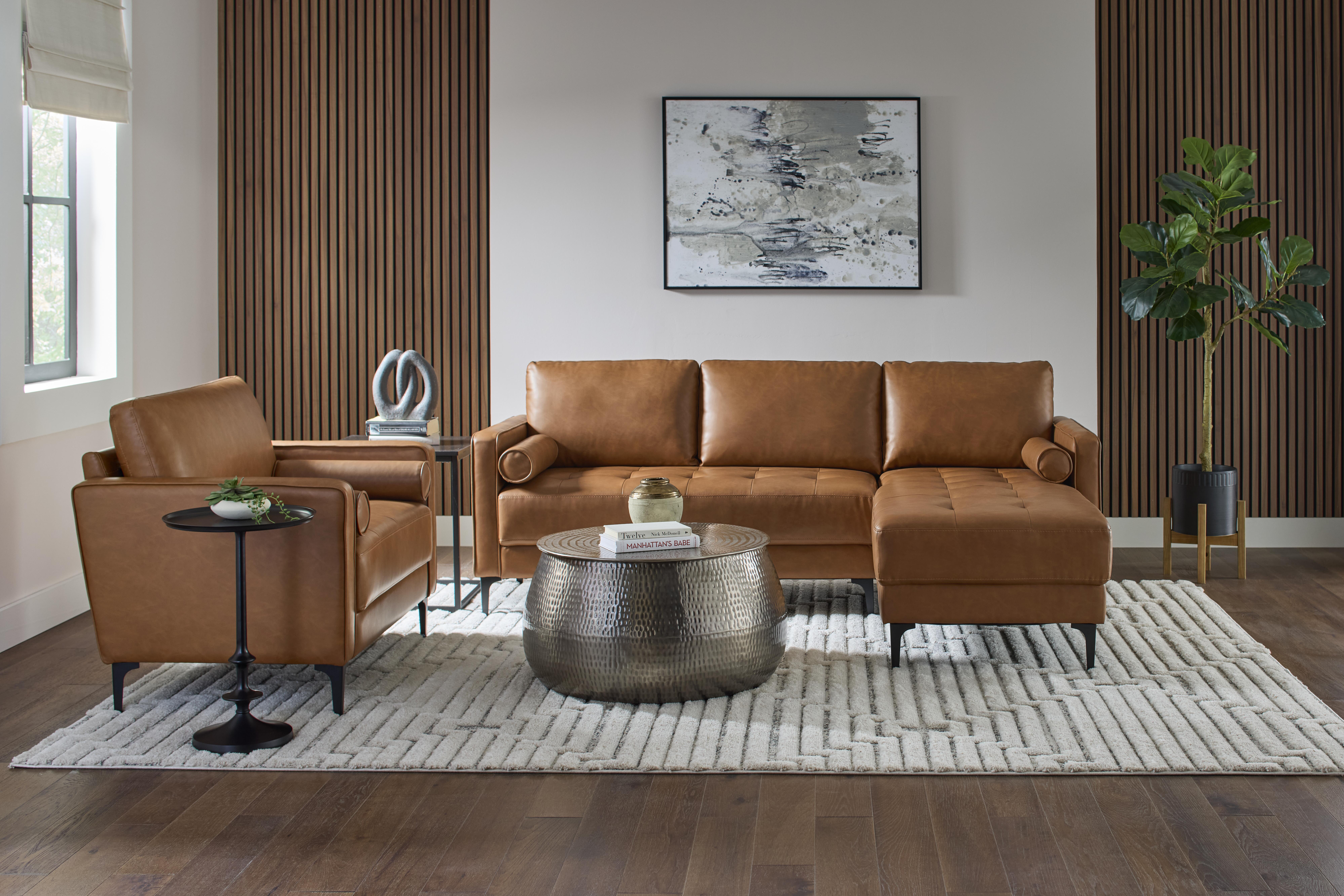 image of orange sofa with carpet on wooden floor