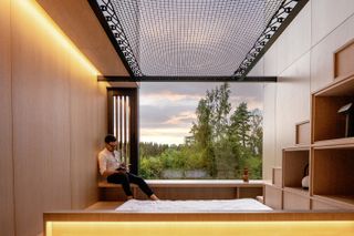 inside Estonian treehouse Piil by architecture studio Arsenit