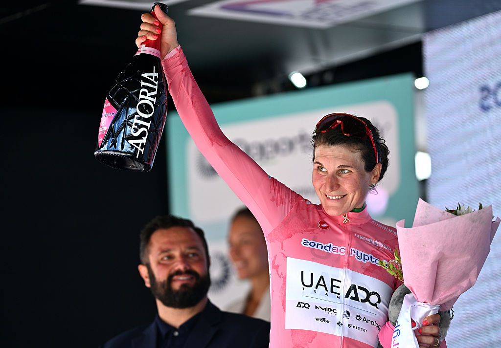 MONTE NERONE, ITALY - JULY 12: Elisa Longo Borghini of Italy and UAE Team ADQ celebrates at podium as Pink Leader Jersey winner during the 36th Giro d'Italia Women 2025, Stage 7 a 150km stage from Fermignano to Monte Nerone 1396m / #UCIWWT / on July 12, 2025 in Monte Nerone, Italy. (Photo by Luc Claessen/Getty Images)