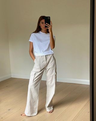 White T-shirt and cream trousers outfit