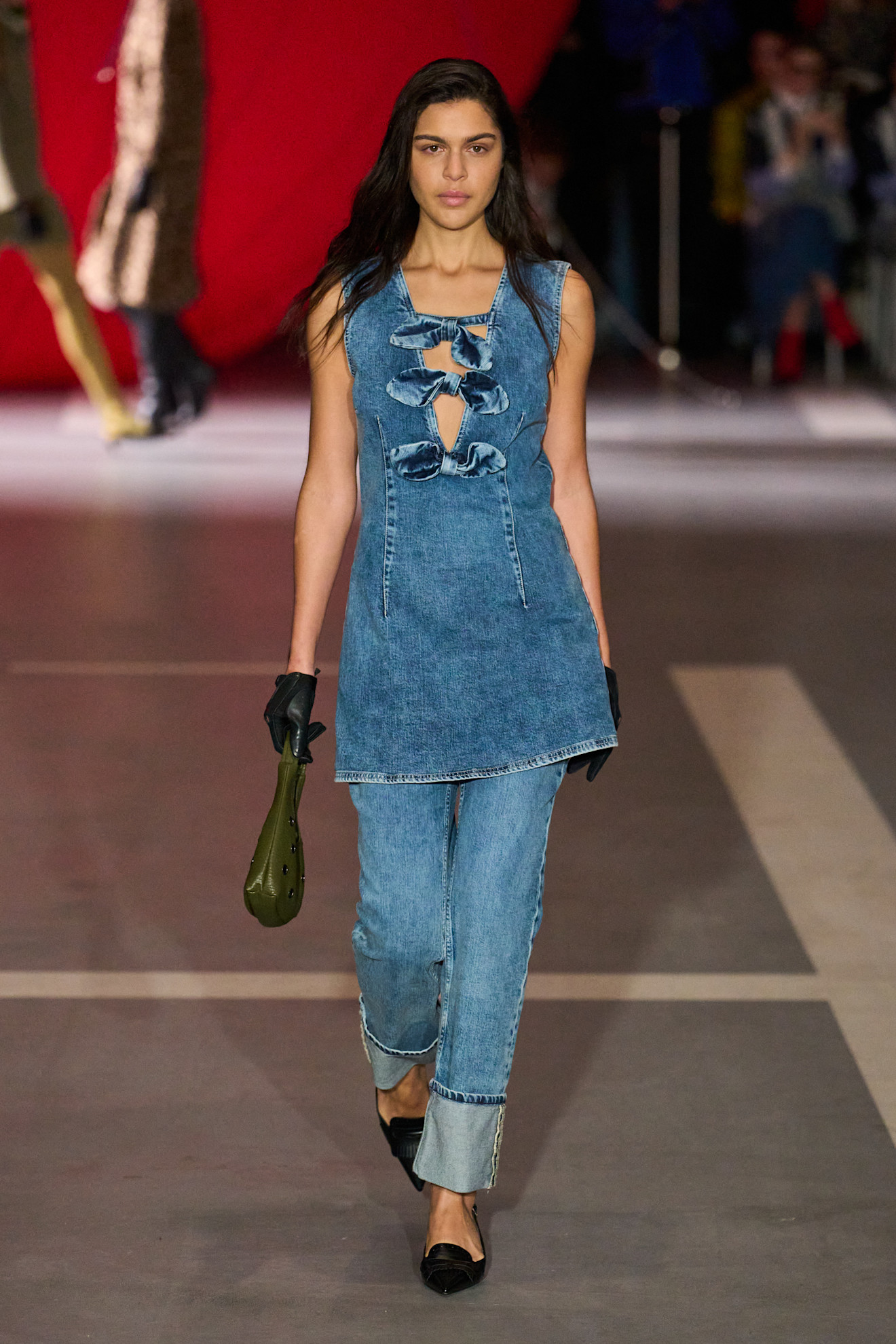 Woman in denim dress and jeans