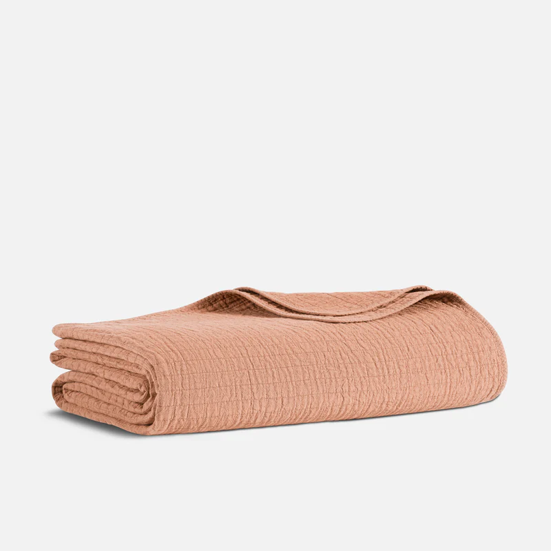 Coral pink bed blanket