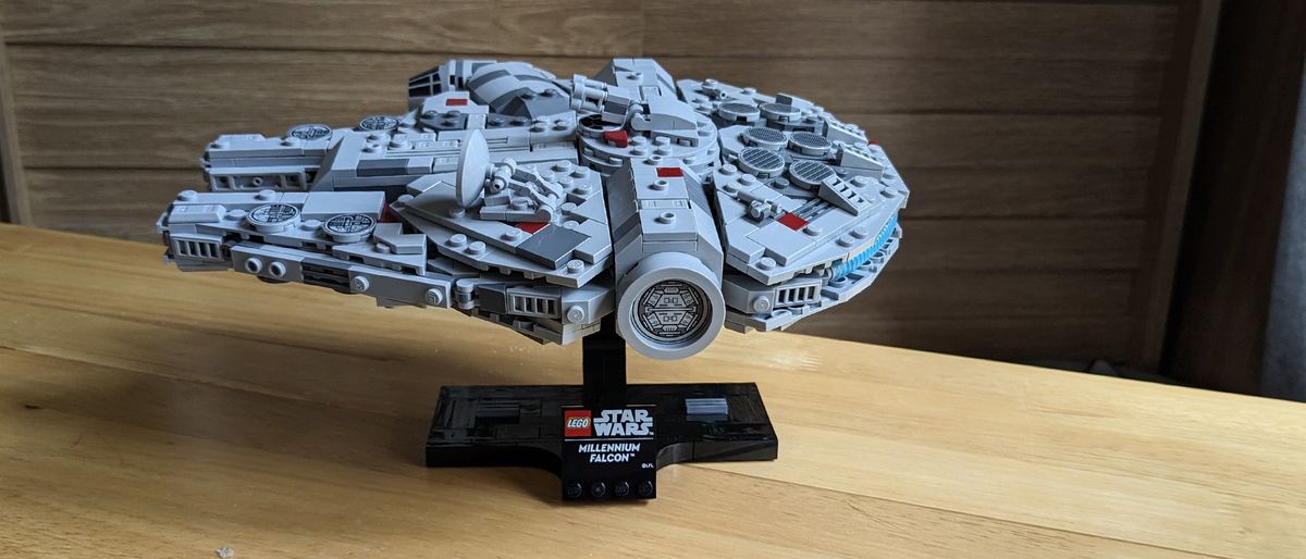 Lego Star Wars Millennium Falcon on a wooden sideboard