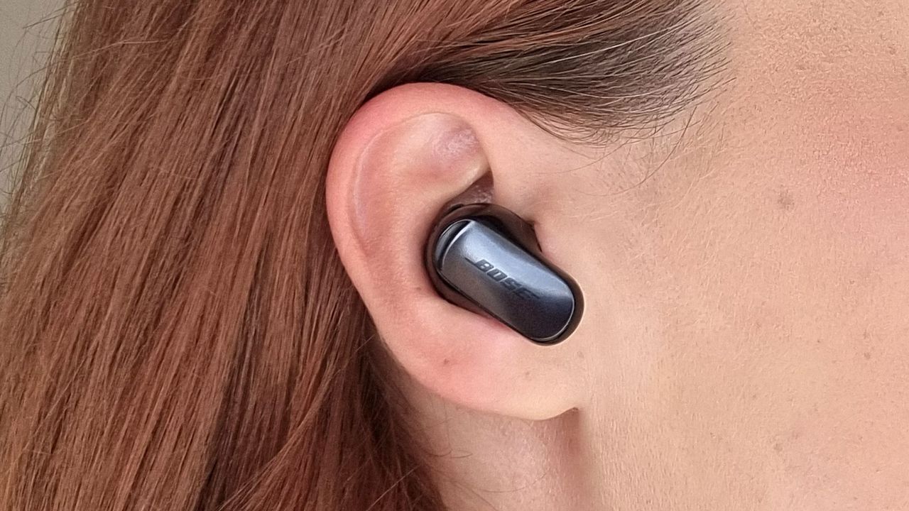 A picture of our reviewer wearing the Bose QuietComfort Ultra (Gen 2) earbuds