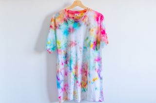A t-shirt that has been tie dyed using ice