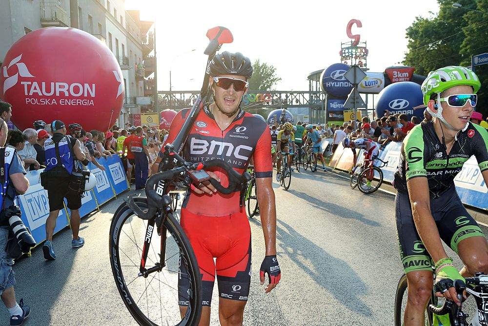 Marcus Burghardt (BMC) walks his bike across the line