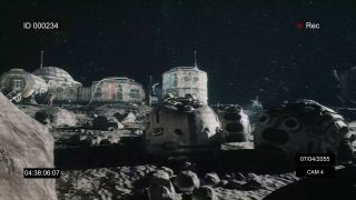 a series of grey buildings and domes on the surface of the moon