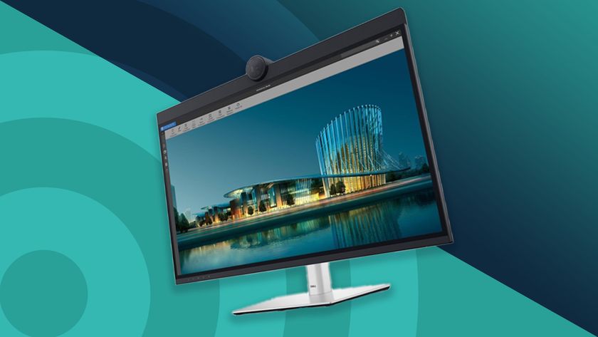 A Dell 6K monitor against a techradar background