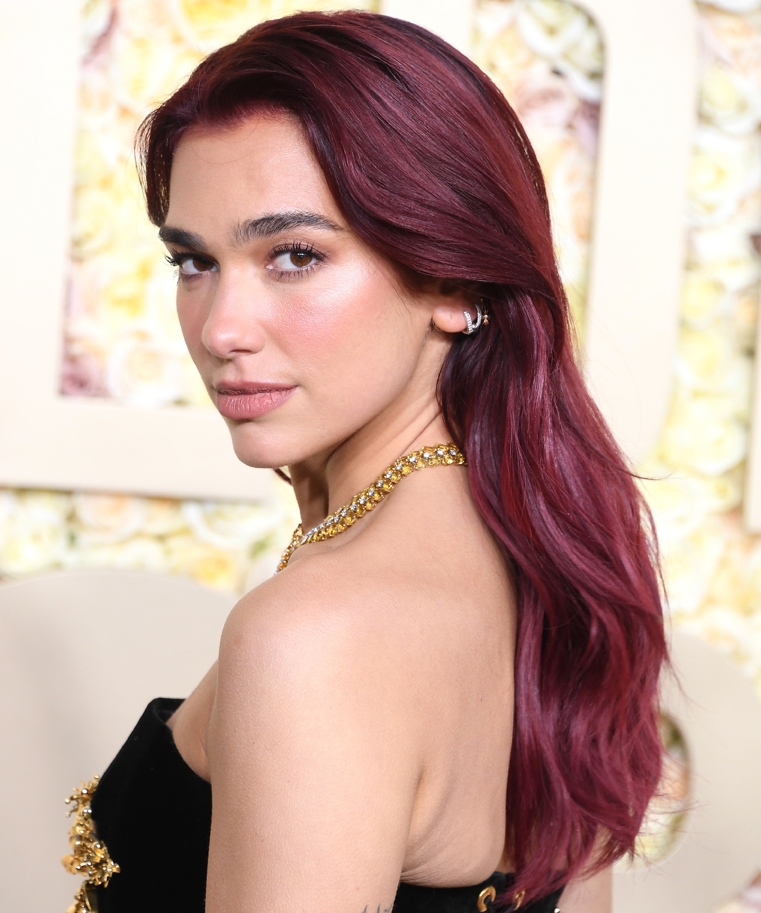 Dua Lipa with cherry red hair