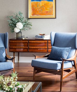 room with chairs and wooden flooring