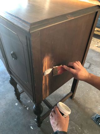Preparing a wooden buffet for painting in white chalk paint