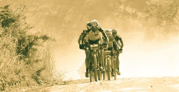 Rwandan Adrien Niyonshuti leads the pack up one of the many climbs