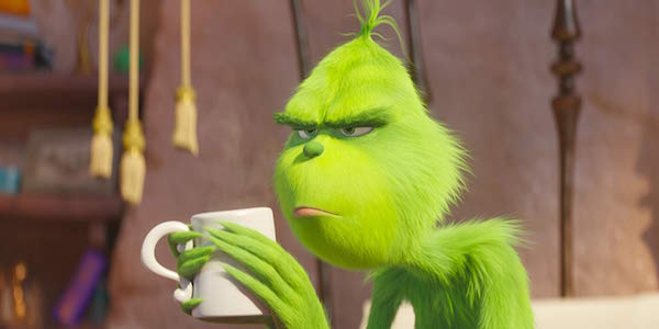 Benedict Cumberbatch&#039;s Grinch holding coffee mug