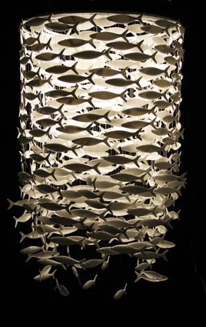 hanging lights with lots of fish around it