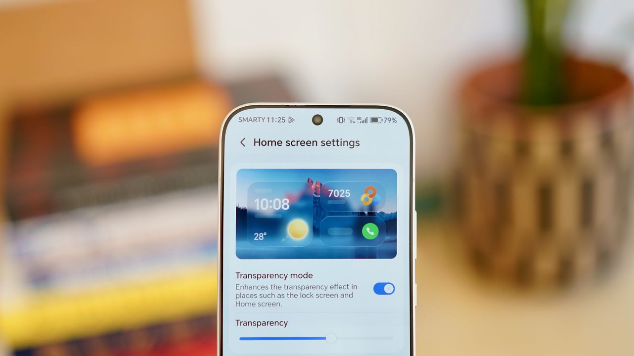 A white Honor 600 Pro resting on a wooden table