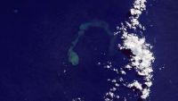 A satellite image showing a giant plume of discolored water beneath the surface